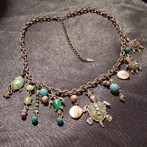 Whimsical Turtle Charm Necklace with Green and Gold Details